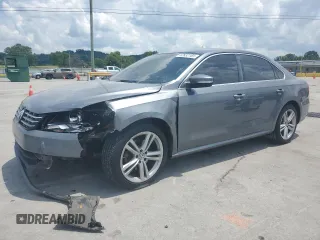 2014 Volkswagen Passat SE with VIN 1VWBN7A33EC092798, listed as a Copart auction lot 62832165 with 200,134 mi miles and Salvage title. Bid and sale history available at DreamBid. Image 1.