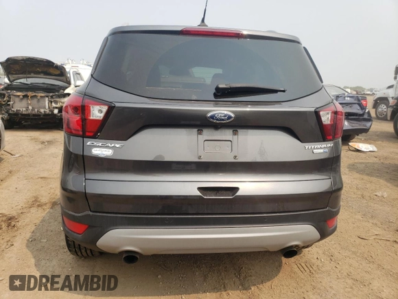 2019 Ford Escape Titanium with VIN 1FMCU9J98KUA56391, listed as a Copart auction lot 59215935 with 27,056 mi miles and Salvage title. Bid and sale history available at DreamBid. Image 6.