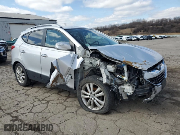 2011 Hyundai Tucson Limited with VIN KM8JUCAC3BU292348, listed as a Copart auction lot 50919925 with 184,505 mi miles and Salvage Title. Bid and sale history available at DreamBid. Image 4.