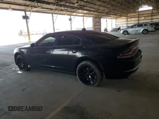 2015 Dodge Charger SXT with VIN 2C3CDXJG9FH748809, listed as a Copart auction lot 61682335 with 128,252 mi miles and Salvage title. Bid and sale history available at DreamBid. Image 2.