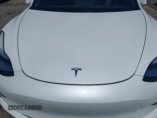 2020 Tesla Model 3 Standard Range Plus z VIN 5YJ3E1EAXLF806360, wystawiony jako IAAI lot #42386624 z przebiegiem 69 916 mil mil oraz . Historia ofert i sprzedaży dostępna na DreamBid. Obrazek 10.