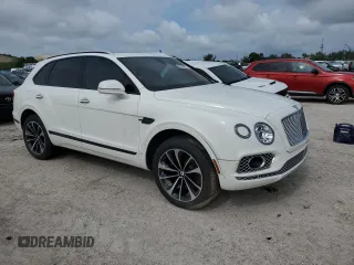 2018 Bentley Bentayga Signature z VIN SJAAC2ZVXJC016875, wystawiony jako Copart lot #56658603 z przebiegiem 44 094 mil mil oraz . Historia ofert i sprzedaży dostępna na DreamBid. Obrazek 4.