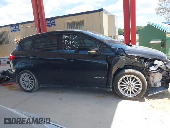 2013 Ford C-Max SE z VIN 1FADP5AUXDL511432, wystawiony jako IAAI lot #42314733 z przebiegiem 140 616 mil mil oraz . Historia ofert i sprzedaży dostępna na DreamBid. Obrazek 13.
