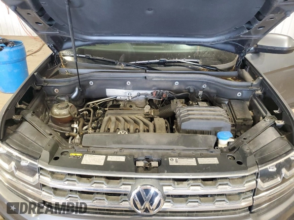 2018 Volkswagen Atlas SE with VIN 1V2KR2CA9JC571127, listed as a Copart auction lot 58188885 with 106,745 mi miles and Salvage title. Bid and sale history available at DreamBid. Image 12.