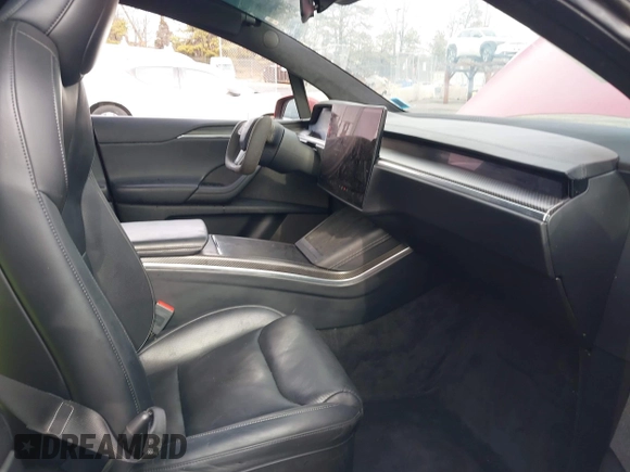 2022 Tesla Model X Plaid with VIN 7SAXCBE60NF330246, listed as a IAAI auction lot 41477394 with 51,612 mi miles and . Bid and sale history available at DreamBid. Image 5.