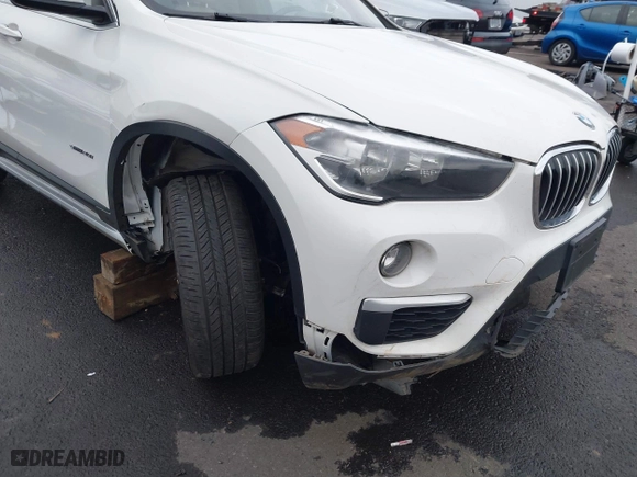 2018 BMW X1 sDrive28i with VIN WBXHU7C32J5H44246, listed as a IAAI auction lot 41477050 with 69,858 mi miles. Bid and sale history available at carsss.com. Image 6.