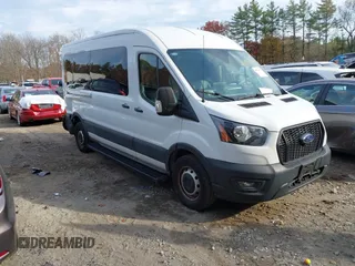 2023 Ford Transit Cargo with VIN 1FTBR1C86PKA52494, listed as a IAAI auction lot 40740671 with 9,999 mi miles and . Bid and sale history available at DreamBid. Image 1.