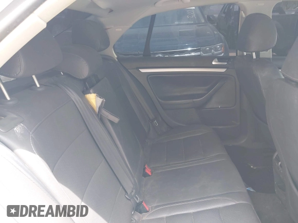 2008 Volkswagen Jetta SE z VIN 3VWRM71K38M176776, wystawiony jako IAAI lot #42244339 z przebiegiem 183 673 mil mil oraz . Historia ofert i sprzedaży dostępna na DreamBid. Obrazek 8.