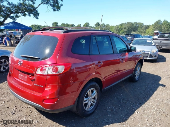 2012 Hyundai Santa Fe GLS with VIN 5XYZG3AB9CG143788, listed as a IAAI auction lot 40249450 with 139,594 mi miles. Bid and sale history available at carsss.com. Image 4.