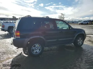 2004 Ford Escape XLT with VIN 1FMCU03114KA97656, listed as a Copart auction lot 48920965 with 229,620 mi miles and Salvage Title. Bid and sale history available at carsss.com. Image 3.