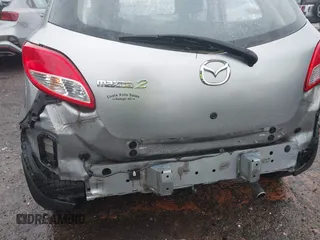 2011 Mazda 2 Sport with VIN JM1DE1HY1B0127409, listed as a IAAI auction lot 42015727 with 154,385 mi miles. Bid and sale history available at carsss.com. Image 13.