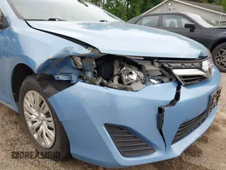 2012 Toyota Camry L z VIN 4T1BF1FK7CU561214, wystawiony jako IAAI lot #42286118 z przebiegiem 182 553 mil mil oraz . Historia ofert i sprzedaży dostępna na DreamBid. Obrazek 6.