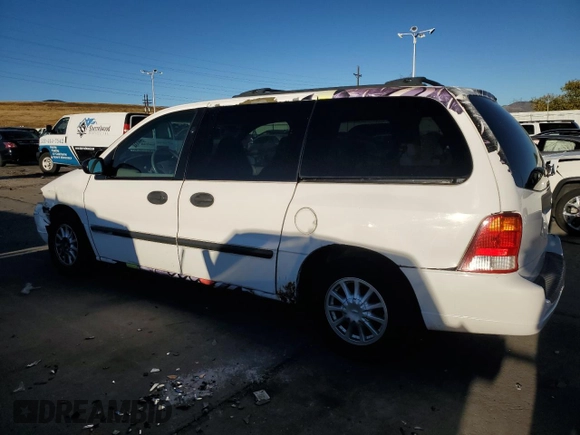 2003 Ford Windstar LX with VIN 2FMZA51493BB24849, listed as a Copart auction lot 76728704 with 156,820 mi miles and Salvage Title. Bid and sale history available at DreamBid. Image 2.