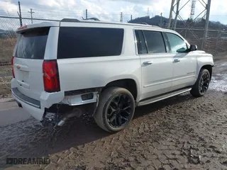 2017 Chevrolet Suburban Premier with VIN 1GNSKJKC9HR406373, listed as a IAAI auction lot 41695349 with 99,863 mi miles. Bid and sale history available at carsss.com. Image 4.