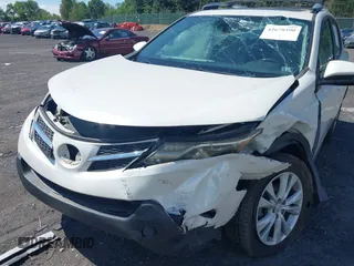 2014 Toyota RAV4 Limited with VIN 2T3DFREV0EW165977, listed as a IAAI auction lot 42679390 with 59,874 mi miles and . Bid and sale history available at DreamBid. Image 6.