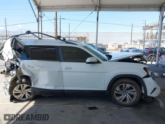 2021 Volkswagen Atlas SE z VIN 1V2HR2CA8MC514027, wystawiony jako IAAI lot #42260413 z przebiegiem 37 687 mil mil oraz . Historia ofert i sprzedaży dostępna na DreamBid. Obrazek 13.