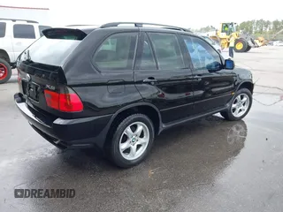 2003 BMW X5 3.0i with VIN 5UXFA53563LW26813, listed as a IAAI auction lot 41873041 with 188,523 mi miles. Bid and sale history available at carsss.com. Image 4.