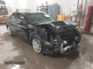 2007 Cadillac STS z VIN 1G6DW677X70115076, wystawiony jako IAAI lot #41797967 z przebiegiem 120 878 mil mil oraz . Historia ofert i sprzedaży dostępna na DreamBid. Obrazek 1.