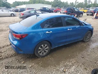 2023 Kia Rio S with VIN 3KPA24AD6PE548027, listed as a Copart auction lot 63697104 with 34,588 mi miles and Salvage Title. Bid and sale history available at carsss.com. Image 3.