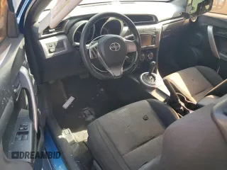 2014 Scion tC z VIN JTKJF5C72E3069652, wystawiony jako Copart lot #59791195 z przebiegiem 178 938 mil mil oraz Szkoda całkowita • Salvage title. Historia ofert i sprzedaży dostępna na DreamBid. Obrazek 8.