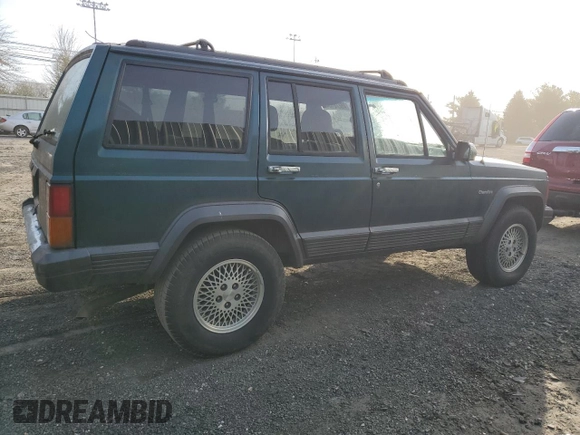 1996 Jeep Cherokee Country with VIN 1J4FJ78S9TL252803, listed as a Copart auction lot 49278184 with 180,420 mi miles and Clean Title. Bid and sale history available at carsss.com. Image 3.