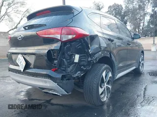 2018 Hyundai Tucson Sport with VIN KM8J33AL4JU753431, listed as a IAAI auction lot 41685678 with 71,934 mi miles. Bid and sale history available at carsss.com. Image 6.