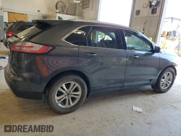 2019 Ford Edge SEL with VIN 2FMPK4J95KBB14991, listed as a Copart auction lot 60068825 with 68,850 mi miles and Salvage title. Bid and sale history available at DreamBid. Image 3.