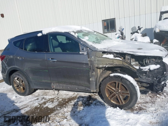2017 Hyundai Santa Fe 2.4L with VIN 5NMZUDLB4HH034437, listed as a IAAI auction lot 41565545 with 96,640 mi miles and . Bid and sale history available at DreamBid. Image 13.