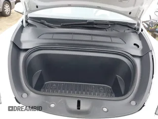 2024 Tesla Model Y with VIN 7SAYGDED4RF055859, listed as a IAAI auction lot 42201099 with 17,373 mi miles and . Bid and sale history available at DreamBid. Image 10.