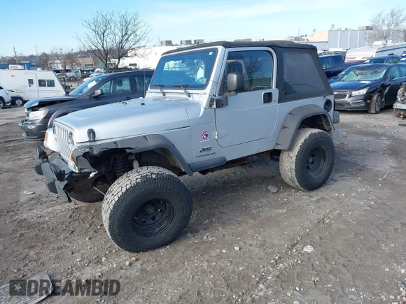2003 Jeep Wrangler X with VIN 1J4FA39S33P363153, listed as a IAAI auction lot 41584805 with 160,676 mi miles. Bid and sale history available at carsss.com. Image 23.