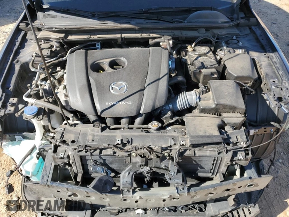 2019 Mazda 3 Premium with VIN 3MZBPAEM2KM104699, listed as a Copart auction lot 86170374 with 59,618 mi miles and Salvage Title. Bid and sale history available at DreamBid. Image 11.