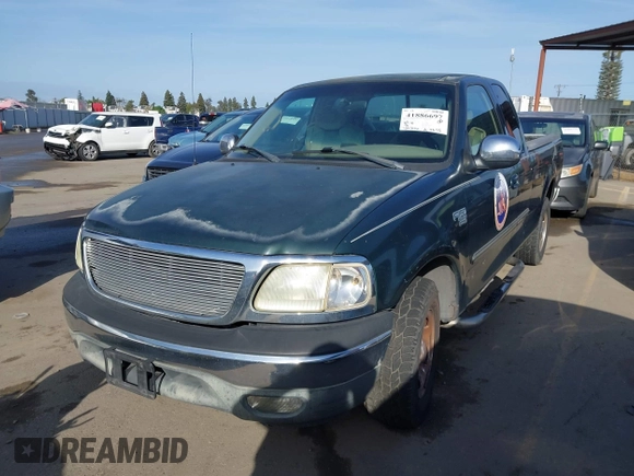 2002 Ford F-150 XL with VIN 1FTRX17L42NA52360, listed as a IAAI auction lot 41886697 with 121,346 mi miles. Bid and sale history available at carsss.com. Image 2.