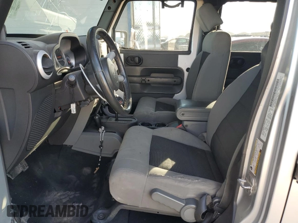 2010 Jeep Wrangler Unlimited Sahara with VIN 1J4HA5H13AL184449, listed as a Copart auction lot 43421945 with 176,725 mi miles and Salvage Title. Bid and sale history available at carsss.com. Image 7.