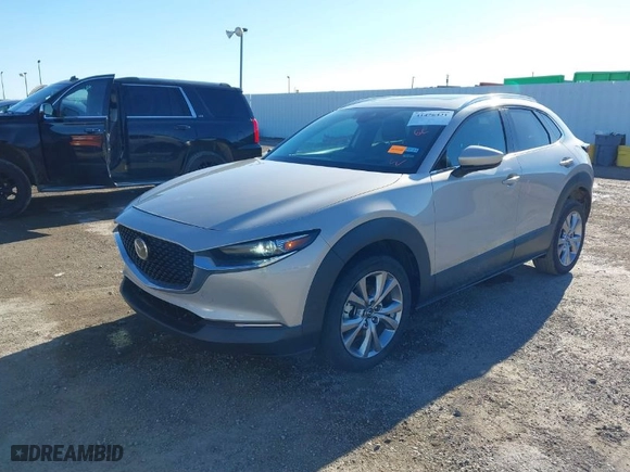 2023 Mazda CX-30 2.5 S Premium Package with VIN 3MVDMBDM5PM525771, listed as a IAAI auction lot 41476431 with 39,326 mi miles. Bid and sale history available at carsss.com. Image 2.
