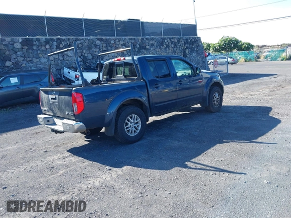 2019 Nissan Frontier SV with VIN 1N6AD0EV4KN788958, listed as a IAAI auction lot 42350160 with 129,837 mi miles and . Bid and sale history available at DreamBid. Image 4.