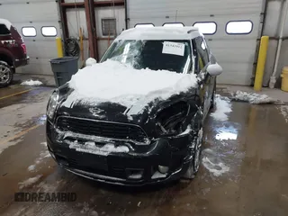 2014 MINI Countryman S with VIN WMWZC5C57EWP39161, listed as a IAAI auction lot 41342912 with 108,459 mi miles and . Bid and sale history available at DreamBid. Image 12.