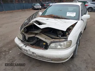 2001 Cadillac Catera z VIN W06VR54R31R002275, wystawiony jako IAAI lot #41328461 z przebiegiem 140 400 mil mil oraz . Historia ofert i sprzedaży dostępna na DreamBid. Obrazek 6.