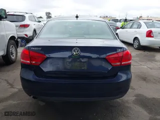 2015 Volkswagen Passat 1.8T Wolfsburg Ed with VIN 1VWAT7A32FC097106, listed as a IAAI auction lot 41913707 with 185,698 mi miles. Bid and sale history available at carsss.com. Image 16.