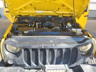 2015 Jeep Wrangler Unlimited Sport with VIN 1C4BJWDG1FL566224, listed as a Copart auction lot 64113195 with 127,445 mi miles and Clean title. Bid and sale history available at DreamBid. Image 12.