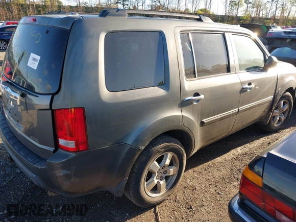 2009 Honda Pilot EX with VIN 5FNYF48489B004599, listed as a IAAI auction lot 42142115 with 999,999 mi miles. Bid and sale history available at carsss.com. Image 4.