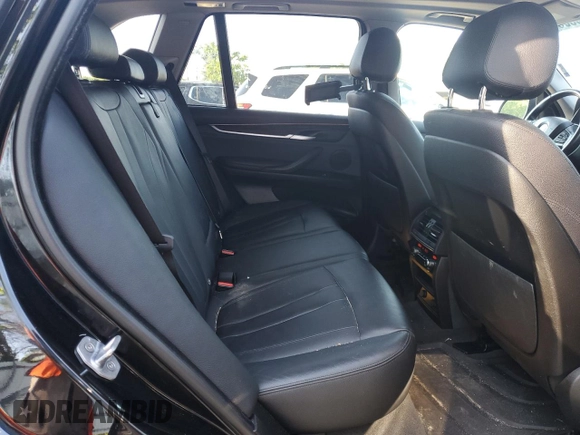 2016 BMW X5 xDrive35i z VIN 5UXKR0C53G0U07941, wystawiony jako Copart lot #56036645 z przebiegiem 108 670 mil mil oraz Szkoda całkowita • Salvage title. Historia ofert i sprzedaży dostępna na DreamBid. Obrazek 11.