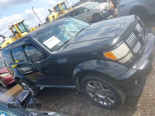 2011 Dodge Nitro Heat with VIN 1D4PT4GK7BW602014, listed as a IAAI auction lot 42371556 with 143,986 mi miles and . Bid and sale history available at DreamBid. Image 13.