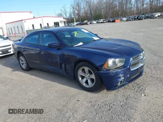 2014 Dodge Charger SXT with VIN 2C3CDXHG1EH207273, listed as a IAAI auction lot 41714382 with 152,023 mi miles. Bid and sale history available at carsss.com. Image 1.