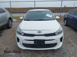2019 Kia Rio S with VIN 3KPA24ABXKE215756, listed as a IAAI auction lot 41556461 with 122,300 mi miles. Bid and sale history available at carsss.com. Image 12.