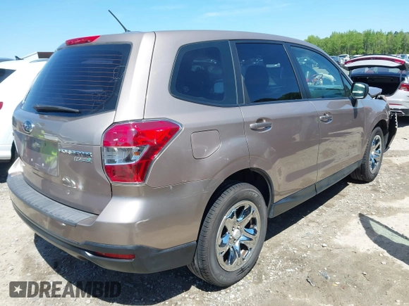 2014 Subaru Forester 2.5i with VIN JF2SJAAC4EH516103, listed as a IAAI auction lot 42065064 with 140,531 mi miles and . Bid and sale history available at DreamBid. Image 4.