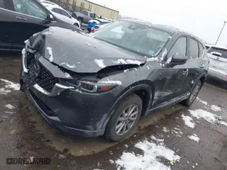 2024 Mazda CX-5 2.5 S Carbon Edition with VIN JM3KFBCL6R0427275, listed as a IAAI auction lot 41138228 with 12,863 mi miles. Bid and sale history available at carsss.com. Image 2.