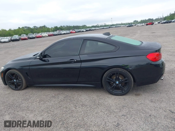 2015 BMW 4 Series 428i with VIN WBA3N3C55FK232319, listed as a IAAI auction lot 42136421 with 140,300 mi miles and . Bid and sale history available at DreamBid. Image 14.