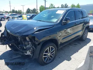 2018 Jeep Grand Cherokee Laredo E z VIN 1C4RJEAG9JC131344, wystawiony jako IAAI lot #42218060 z przebiegiem 126 639 mil mil oraz . Historia ofert i sprzedaży dostępna na DreamBid. Obrazek 18.