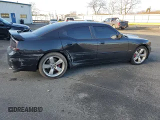 2006 Dodge Charger SRT-8 with VIN 2B3LA73W36H369475, listed as a Copart auction lot 43774705 with 130,495 mi miles and Salvage Title. Bid and sale history available at DreamBid. Image 3.