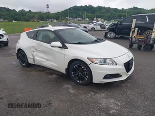 2014 Honda CR-Z EX with VIN JHMZF1D64ES000930, listed as a IAAI auction lot 39418573 with 118,799 mi miles. Bid and sale history available at carsss.com. Image 1.
